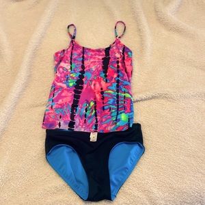 It is a multi colored bathing suit with a reversible bottoms.